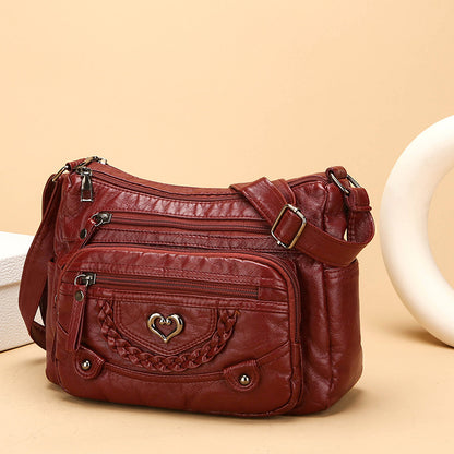Dámska crossbody taška z jemnej PU kože s viacerými vreckami