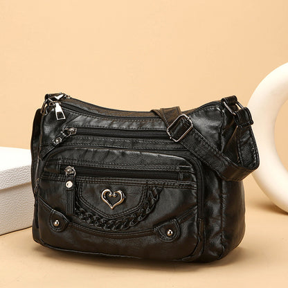 Dámska crossbody taška z jemnej PU kože s viacerými vreckami