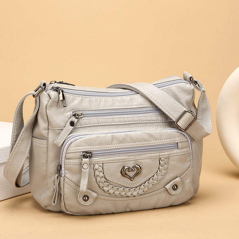 Dámska crossbody taška z jemnej PU kože s viacerými vreckami