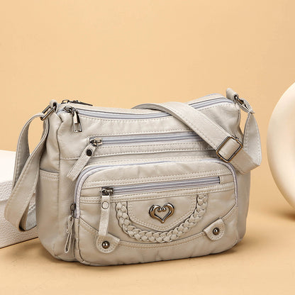Dámska crossbody taška z jemnej PU kože s viacerými vreckami