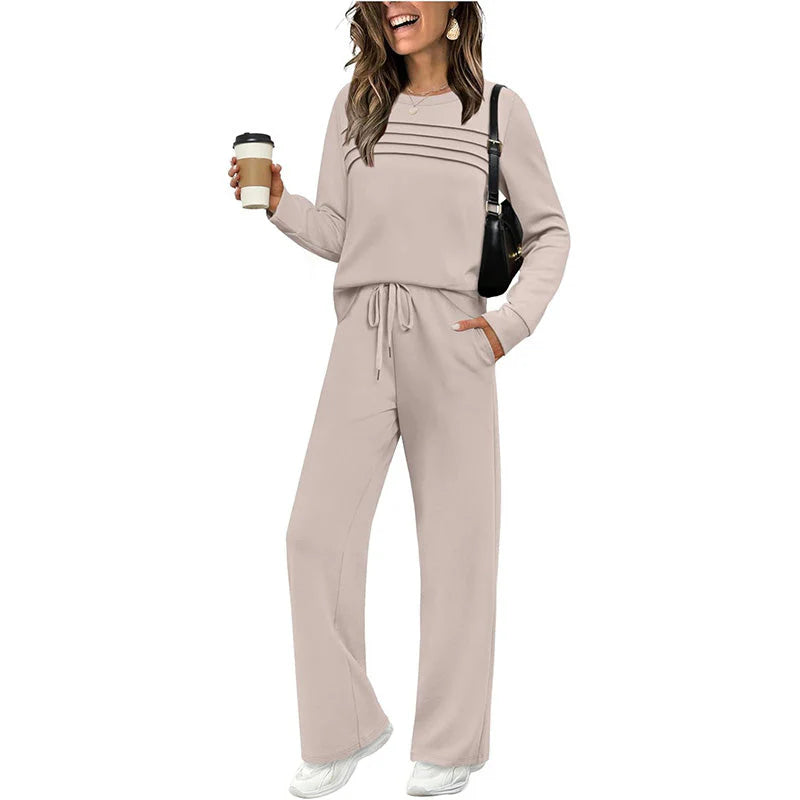🔥Tvoj nový obľúbený outfit! 👗✨ Dámska súprava s blúzou s okrúhlym výstrihom a nohavicami so šnúrkou 🛋️☕