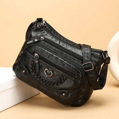 Dámska crossbody taška z jemnej PU kože s viacerými vreckami