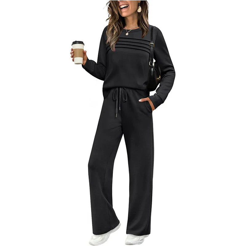 🔥Tvoj nový obľúbený outfit! 👗✨ Dámska súprava s blúzou s okrúhlym výstrihom a nohavicami so šnúrkou 🛋️☕