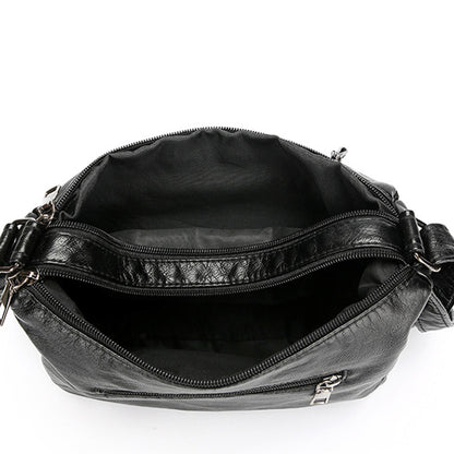 Dámska crossbody taška z jemnej PU kože s viacerými vreckami