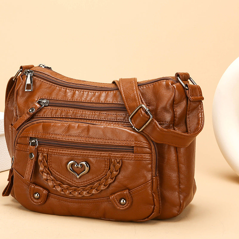 Dámska crossbody taška z jemnej PU kože s viacerými vreckami