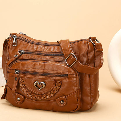 Dámska crossbody taška z jemnej PU kože s viacerými vreckami