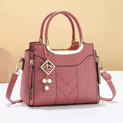 Dámska taška cez rameno s výstrihom do V